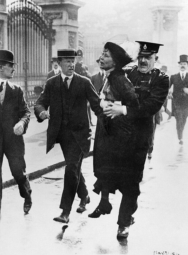 Mrs Emmeline Pankhurst, Leader of the Women's Suffragette movement, is arrested outside Buckingham Palace while trying to present a petition to King George V in May 1914